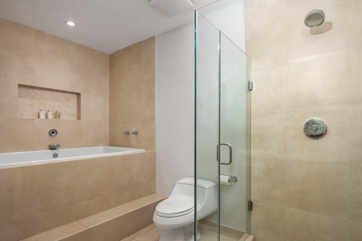 Two Bedroom Oceanfront Suite - Bathroom Tub and Shower